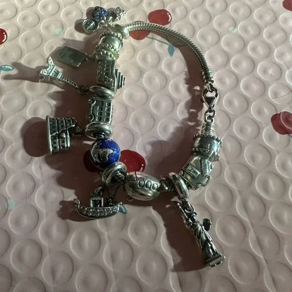 authentic Pandora Travelers charm bracelet. It’s a must have if u travel a-lot. - Picture 3 of 9